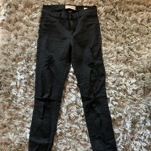 Black jeans with holes